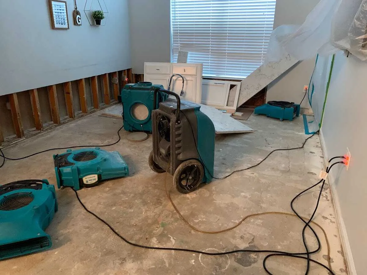 Dehumidifier in flood-cut room for Water Damage Restoration in Pompey
